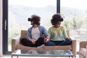 Image showing Multiethnic Couple using virtual reality headset