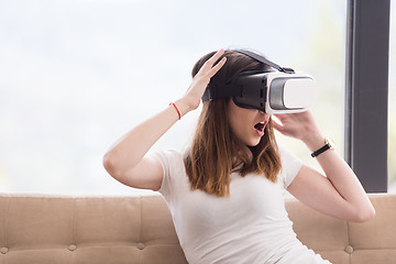 Image showing woman using VR-headset glasses of virtual reality