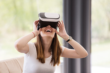 Image showing woman using VR-headset glasses of virtual reality