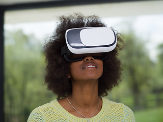 Image showing black woman using VR headset glasses of virtual reality