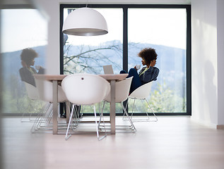 Image showing African American woman in the living room