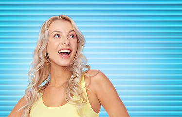 Image showing happy smiling young woman with blonde hair