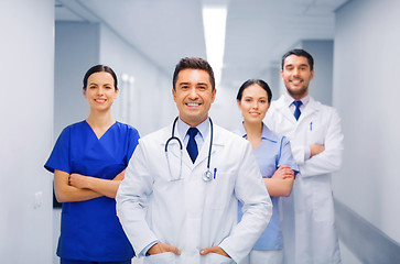 Image showing happy group of medics or doctors at hospital