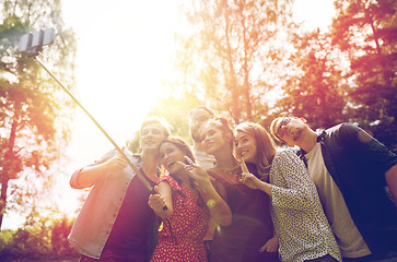 Image showing friends taking selfie at party in summer garden