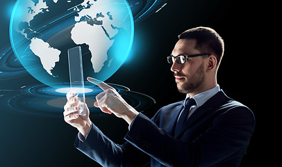 Image showing businessman with tablet pc and virtual globe