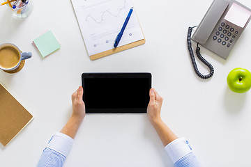 Image showing hands of businesswoman with tablet pc at office