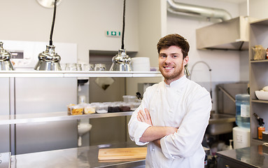 Image showing happy male chef cook at restaurant kitchen