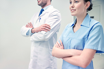 Image showing close up of doctor and nurse at hospital corridor