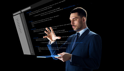 Image showing businessman with tablet pc and virtual coding