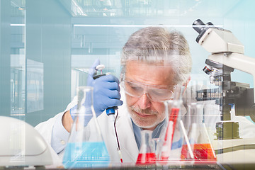 Image showing Senior life science research researching in modern scientific laboratory.