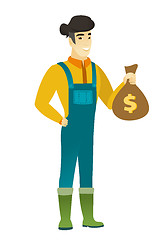 Image showing Asian farmer holding a money bag.