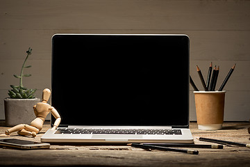 Image showing The front view of notebook and cup of coffee. Inspiration and mock-up concept