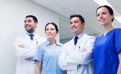 Image showing group of happy medics or doctors at hospital