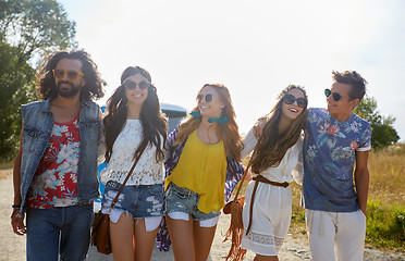 Image showing smiling happy young hippie friends at minivan car