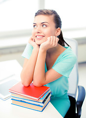 Image showing happy smiling student girl with books