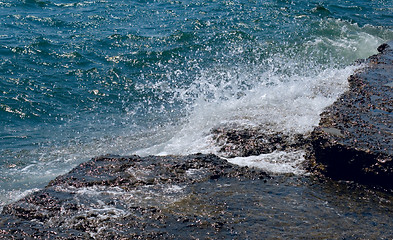 Image showing stones and sea foam