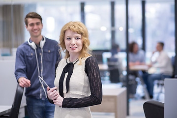 Image showing Business People Working With Tablet in startup office