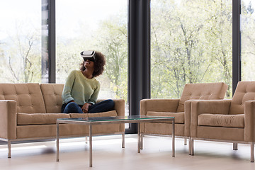 Image showing black woman using VR headset glasses of virtual reality