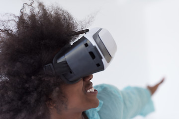 Image showing black girl using VR headset glasses of virtual reality