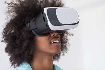 Image showing black girl using VR headset glasses of virtual reality