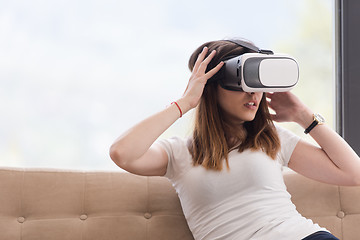 Image showing woman using VR-headset glasses of virtual reality