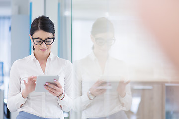 Image showing Business Woman Using Digital Tablet in front of startup Office