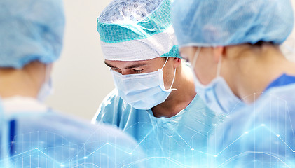 Image showing group of surgeons in operating room at hospital