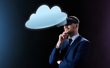 Image showing businessman in virtual reality headset with cloud