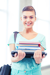 Image showing student with folders and school bag in college