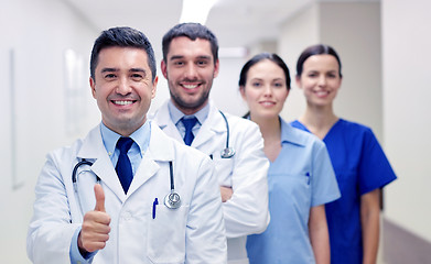 Image showing medics or doctors at hospital showing thumbs up