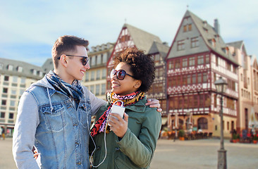 Image showing couple with smartphone and earphones in frankfurt