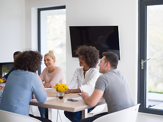 Image showing Multiethnic startup Business Team At A Meeting at modern office 