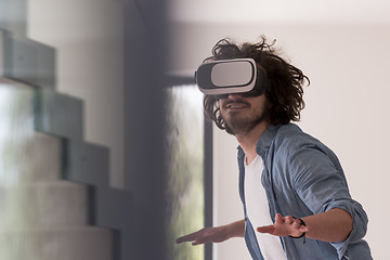 Image showing man using VR-headset glasses of virtual reality