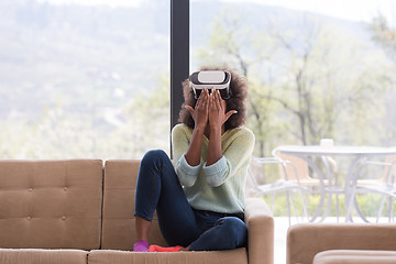 Image showing black woman using VR headset glasses of virtual reality