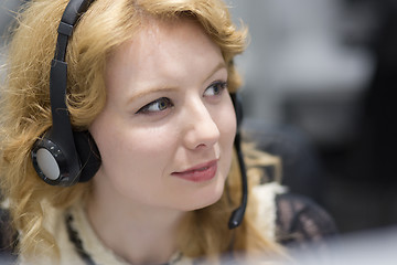 Image showing female call centre operator doing her job