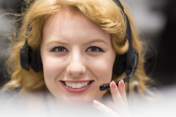 Image showing female call centre operator doing her job