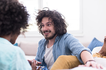 Image showing multiethnic couple in living room