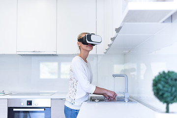 Image showing woman using VR-headset glasses of virtual reality