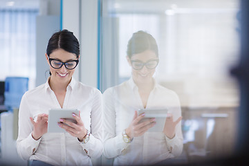 Image showing Business Woman Using Digital Tablet in front of startup Office