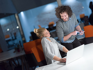 Image showing designers in the night startup office