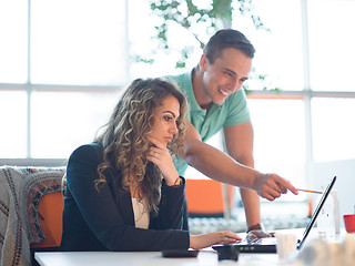 Image showing designers in the night startup office