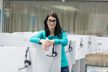 Image showing female call centre operator doing her job