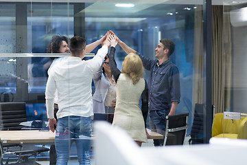 Image showing startup Group of young business people celebrating success