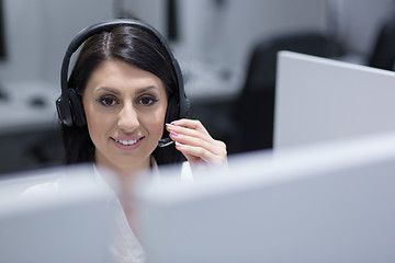 Image showing female call centre operator doing her job