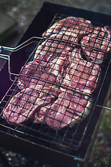 Image showing Grilling fresh entrecote pork