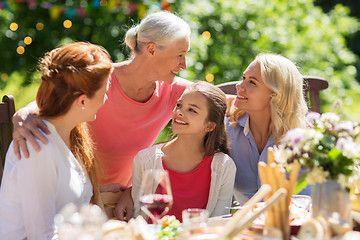 Image showing happy family having dinner or summer garden party