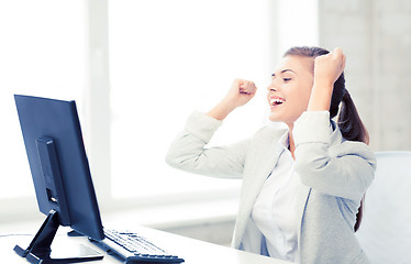 Image showing businesswoman with computer in office