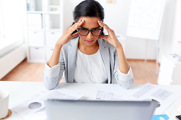 Image showing businesswoman with laptop working at office