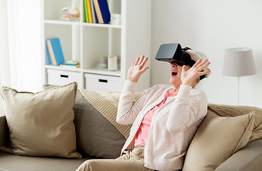 Image showing old woman in virtual reality headset or 3d glasses