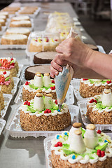 Image showing Manual cakes production